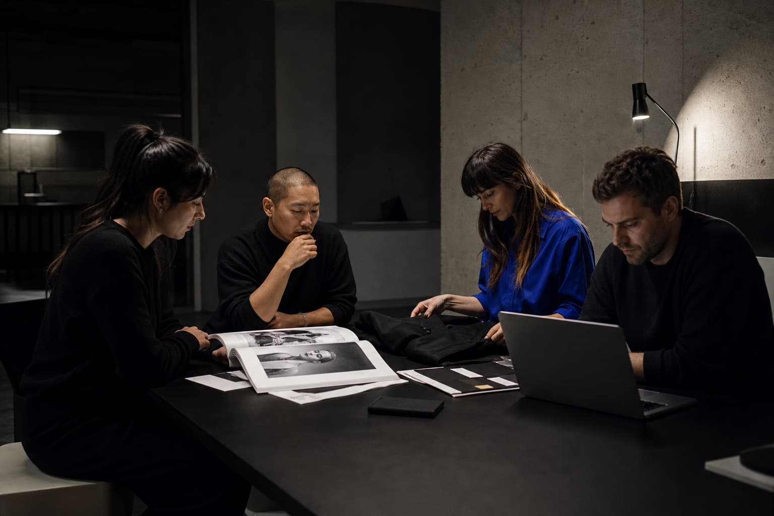 VITON13 multidisciplinary team working together in a dark design studio