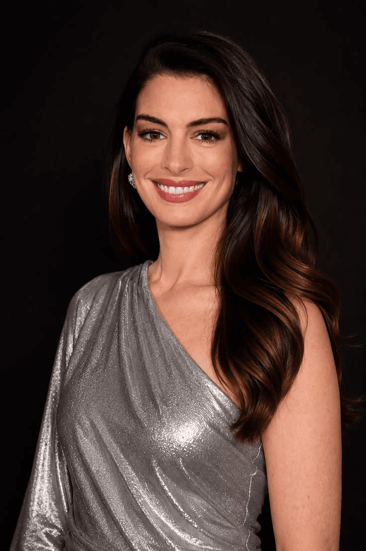 Portrait of actor Anne Hathaway in a silver dress