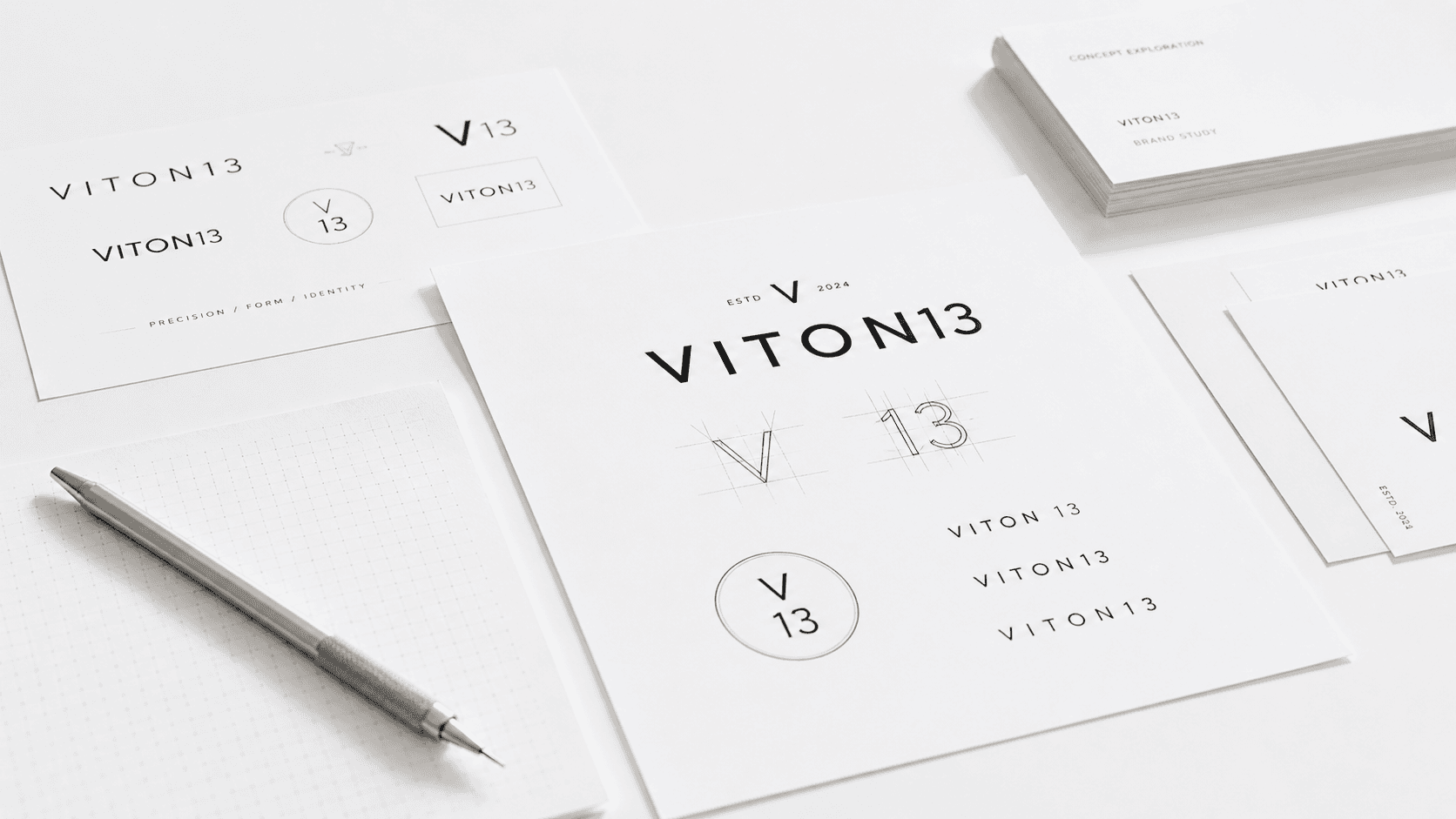VITON13 logo design brand identity system with stationery layout, concept exploration sheets, and premium monochrome visual direction