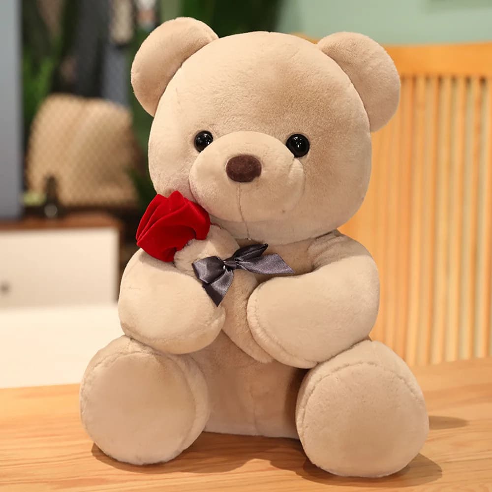 Oso de peluche con rosas