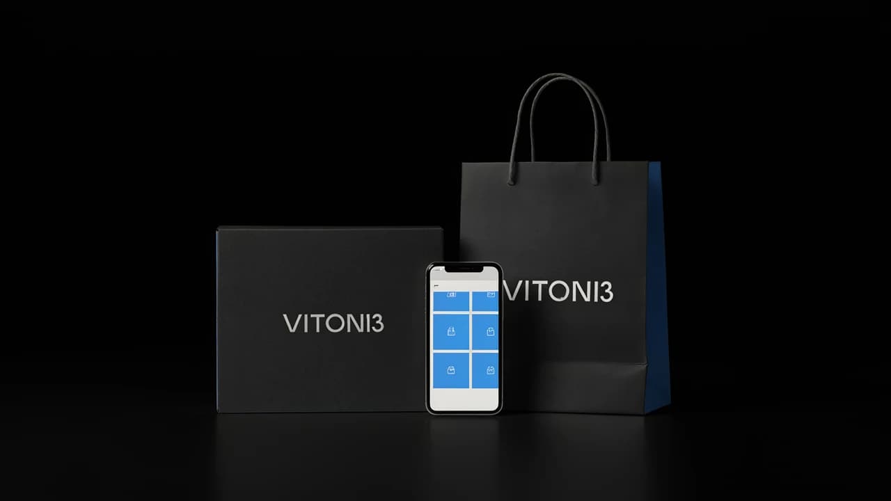 Black VITON13 box and shopping bag with a phone showing a store grid in front